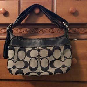 Black Signature Coach purse.